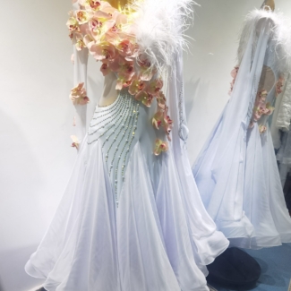white ballroom dress with feathers