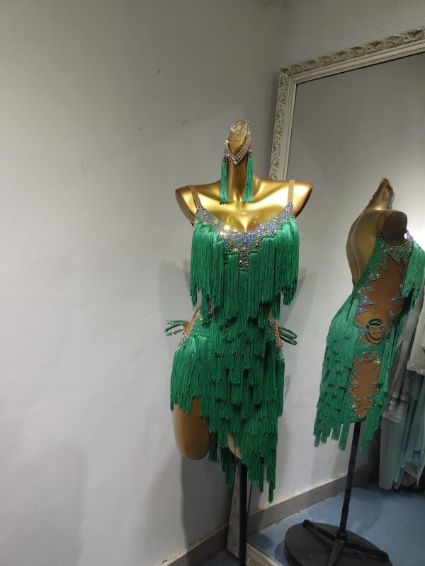 Green fringe Latin dance dress with nude base, crystals and beads.