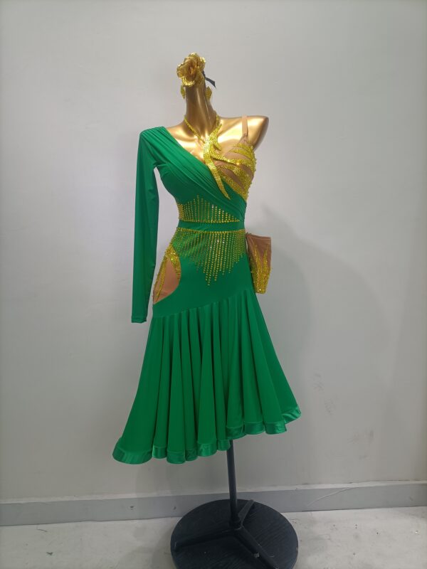 Green and gold Latin and Rhythm dance dress with a flared skirt, golden crystals