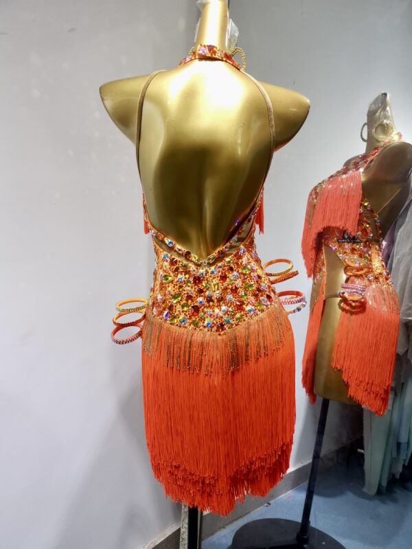 Bright orange Latin and Rhythm dance dress with open back, fringe and sew-on stones - Image 2