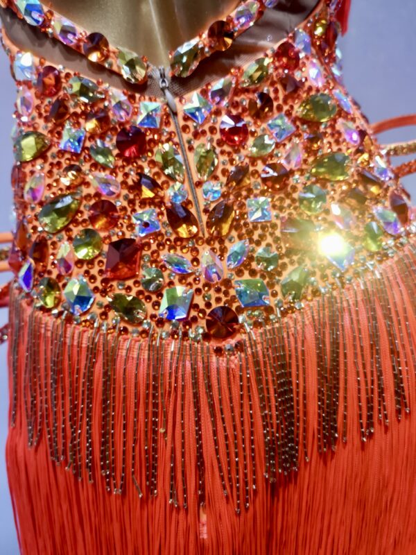 Bright orange Latin and Rhythm dance dress with open back, fringe and sew-on stones - Image 3