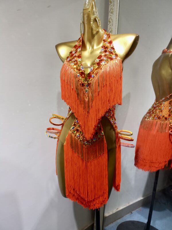 Bright orange Latin and Rhythm dance dress with open back, fringe and sew-on stones